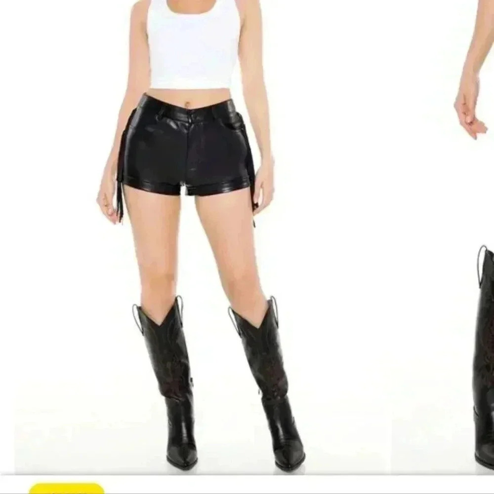 F21 faux leather shorts with fringe
